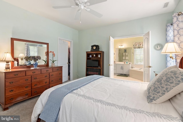 7482 Jeffreys Way, Easton, MD 21601 - bedroom with carpet flooring, connected bathroom, and a ceiling fan