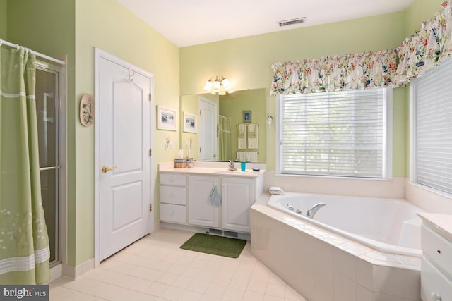 7482 Jeffreys Way, Easton, MD 21601 - bathroom featuring vanity, a garden tub, a shower with curtain, and tile patterned floors