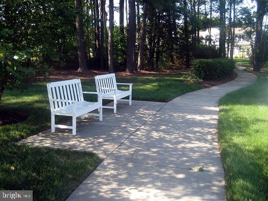 7482 Jeffreys Way, Easton, MD 21601 - view of home's community featuring a lawn and a patio