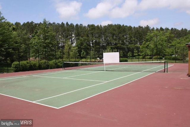 7482 Jeffreys Way, Easton, MD 21601 - view of tennis court with community basketball court and a forest view