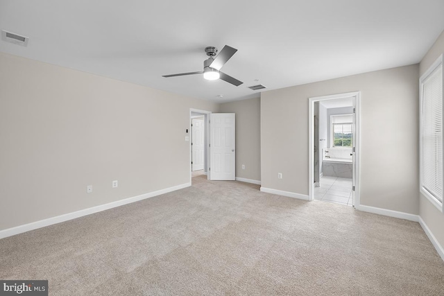 6712 Ridgecrest Rd, New Market, MD 21774 - unfurnished bedroom featuring light carpet, baseboards, ensuite bath, and ceiling fan