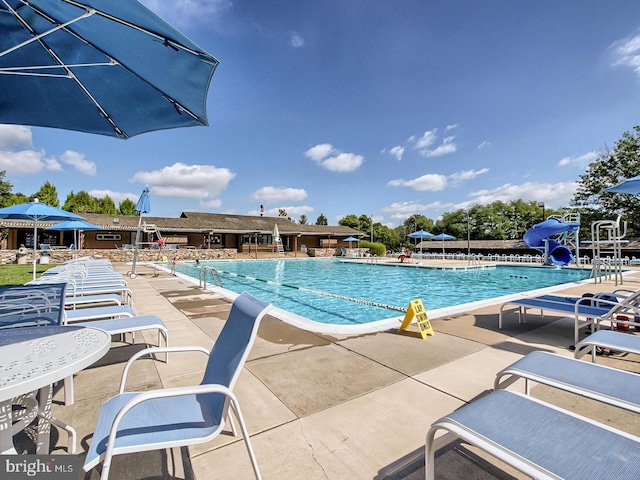 6712 Ridgecrest Rd, New Market, MD 21774 - community pool featuring a water slide and a patio