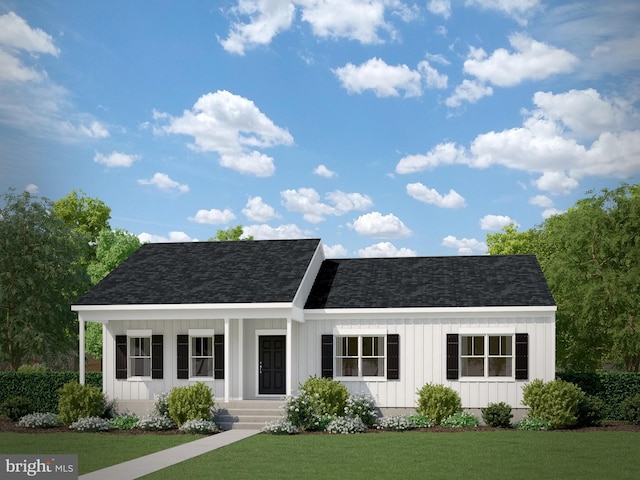 27000 Tatum Rd, Unionville, VA 22567 - view of front of home featuring board and batten siding, a front yard, and roof with shingles