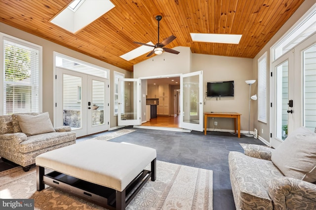 15221 Middlegate Rd, Silver Spring, MD 20905 - living room with a skylight, french doors, wooden ceiling, lofted ceiling, and baseboards