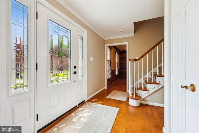 15221 Middlegate Rd, Silver Spring, MD 20905 - entryway with wood finished floors, crown molding, stairway, and baseboards