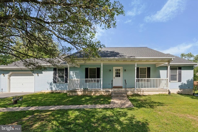 1069 Hearthstone Rd, Lancaster, PA 17603 - view of front of home with an attached garage, a porch, a front lawn, and roof with shingles