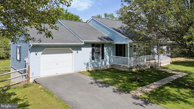 1069 Hearthstone Rd, Lancaster, PA 17603 - view of front of property with a porch, a garage, a shingled roof, and driveway