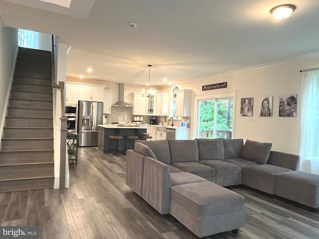 16801 Chalet Ct, Chesterfield, VA 23832 - living area featuring stairway, dark wood-style flooring, a chandelier, ornamental molding, and recessed lighting