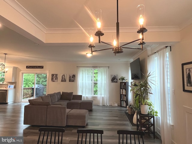16801 Chalet Ct, Chesterfield, VA 23832 - living room featuring a chandelier, dark wood-type flooring, healthy amount of natural light, and ornamental molding