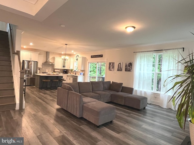 16801 Chalet Ct, Chesterfield, VA 23832 - living area featuring dark wood-style flooring, ornamental molding, stairs, a chandelier, and recessed lighting