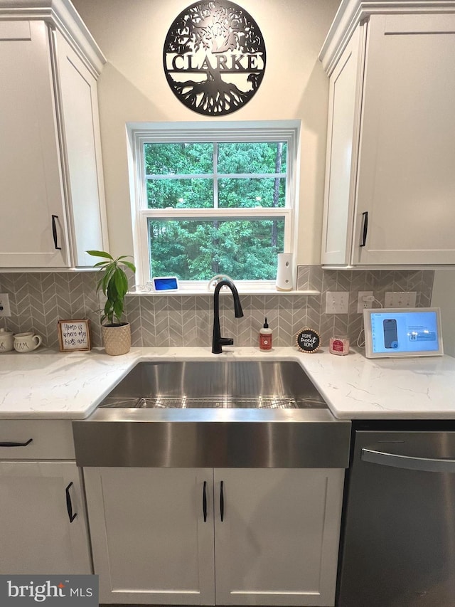 16801 Chalet Ct, Chesterfield, VA 23832 - kitchen with stainless steel dishwasher, decorative backsplash, and plenty of natural light