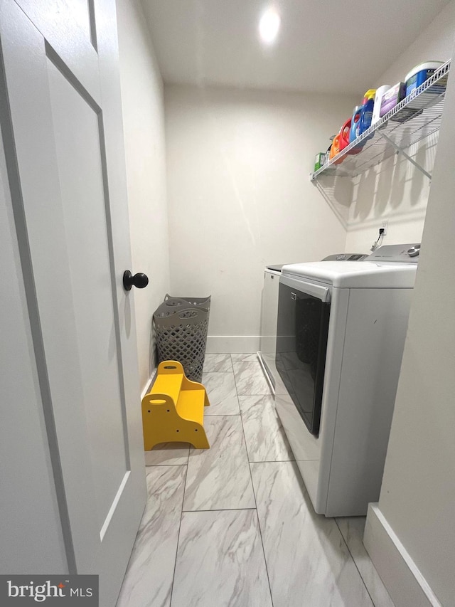 16801 Chalet Ct, Chesterfield, VA 23832 - laundry room with light marble finish flooring, washer and dryer, and baseboards