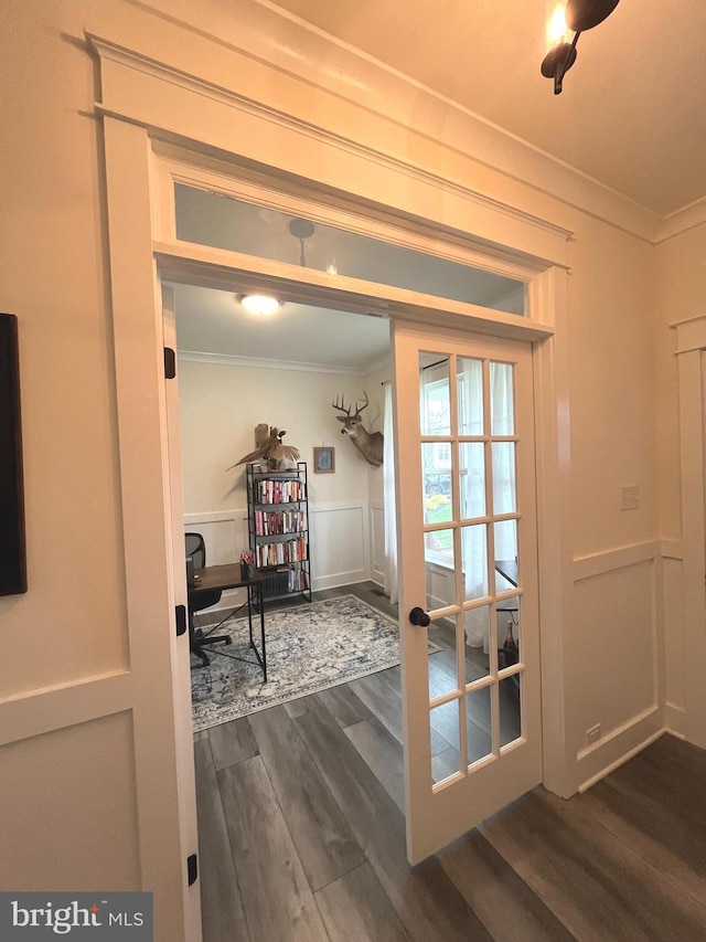 16801 Chalet Ct, Chesterfield, VA 23832 - entryway with ornamental molding, dark wood-type flooring, a decorative wall, and a wainscoted wall