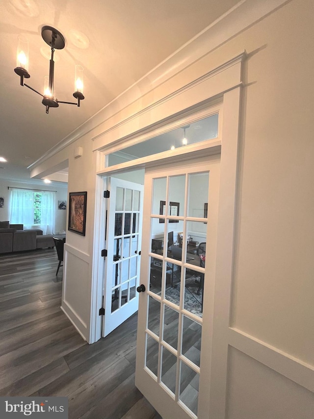 16801 Chalet Ct, Chesterfield, VA 23832 - hall featuring french doors, dark wood finished floors, and a chandelier