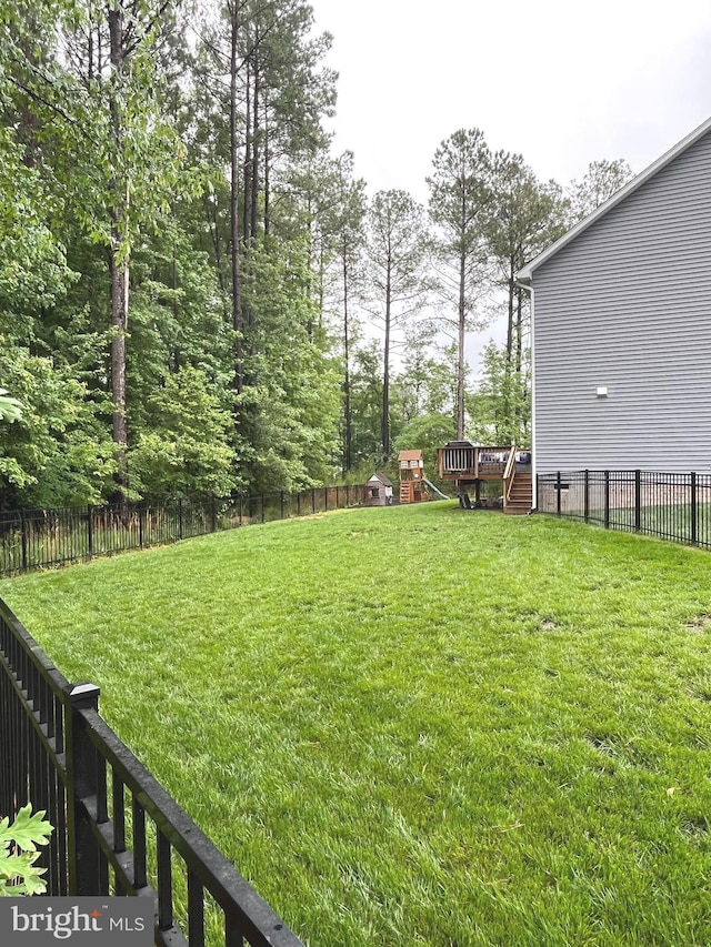 16801 Chalet Ct, Chesterfield, VA 23832 - view of yard featuring a wooden deck and a playground