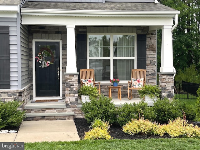 16801 Chalet Ct, Chesterfield, VA 23832 - entrance to property featuring covered porch, stone siding, and a shingled roof
