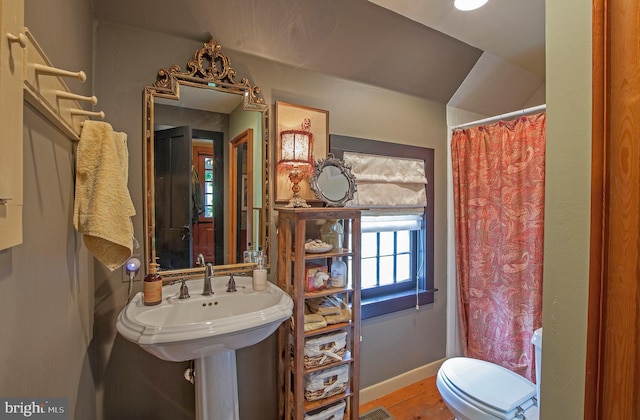 1249 Pebble Hill Rd, Doylestown, PA 18901 - full bathroom featuring toilet, baseboards, and wood finished floors