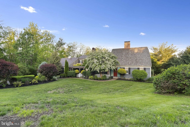 1249 Pebble Hill Rd, Doylestown, PA 18901 - view of front of home with a chimney and a front yard