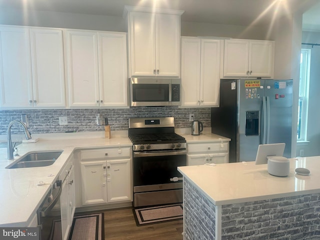 644 Lakemont Dr, Glen Burnie, MD 21060 - kitchen with appliances with stainless steel finishes, a sink, and white cabinetry