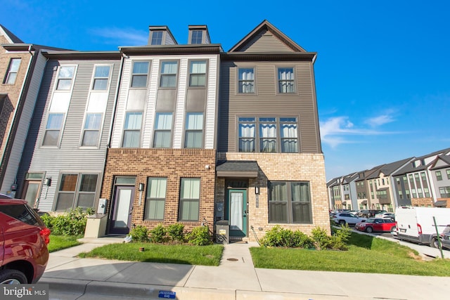 644 Lakemont Dr, Glen Burnie, MD 21060 - multi unit property with brick siding, a chimney, and a residential view