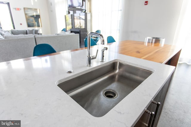 644 Lakemont Dr, Glen Burnie, MD 21060 - kitchen view of a sink and light stone countertops