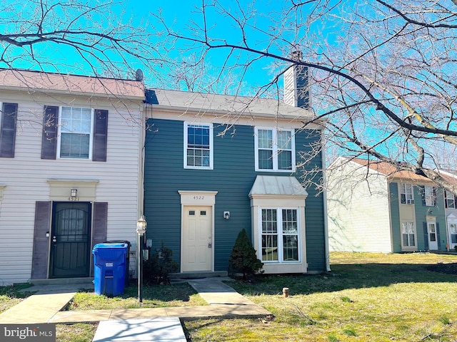 4522 Grouse Pl, Waldorf, MD 20603 - view of front of property featuring a front lawn and a chimney