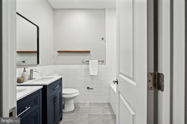 6210 Clearview St, Philadelphia, PA 19138 - bathroom featuring tile walls, vanity, toilet, a bath, and a shower