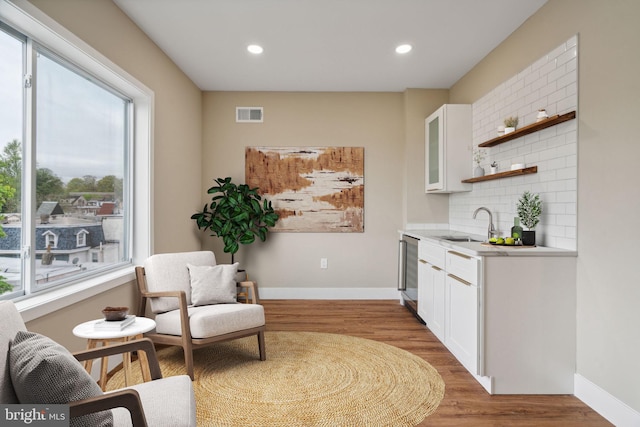 6210 Clearview St, Philadelphia, PA 19138 - sitting room with wood finished floors, recessed lighting, baseboards, and wet bar