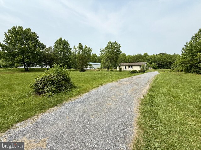 1170 Proctors Purchase Rd, Hartly, DE 19953 - view of front of home with gravel driveway and a front yard