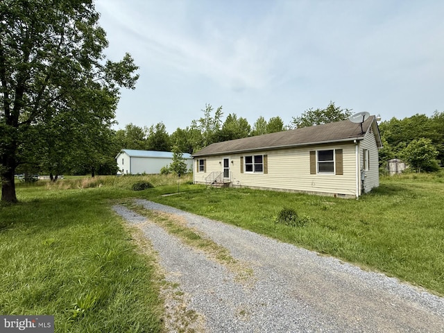 1170 Proctors Purchase Rd, Hartly, DE 19953 - view of front facade featuring driveway and a front yard
