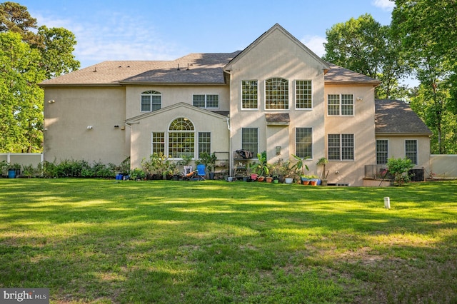 2 Jessica Ct, Tabernacle, NJ 08088 - rear view of property featuring stucco siding, a lawn, and a shingled roof