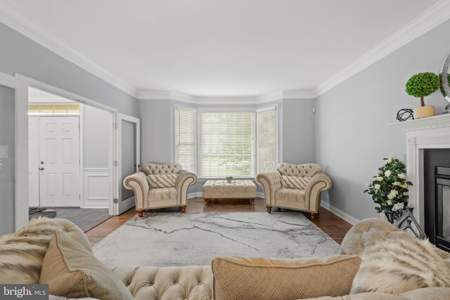 2 Jessica Ct, Tabernacle, NJ 08088 - living area featuring crown molding, a glass covered fireplace, wood finished floors, and baseboards