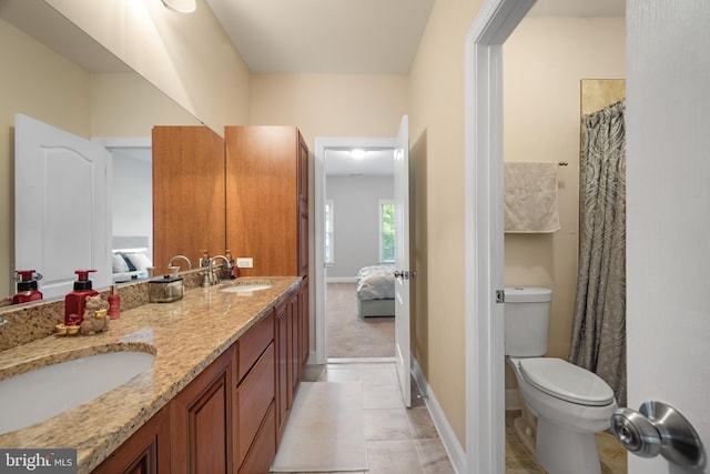 2 Jessica Ct, Tabernacle, NJ 08088 - ensuite bathroom featuring double vanity, toilet, baseboards, and tile patterned floors