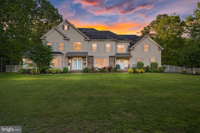 2 Jessica Ct, Tabernacle, NJ 08088 - traditional home with stucco siding, roof mounted solar panels, and stone siding