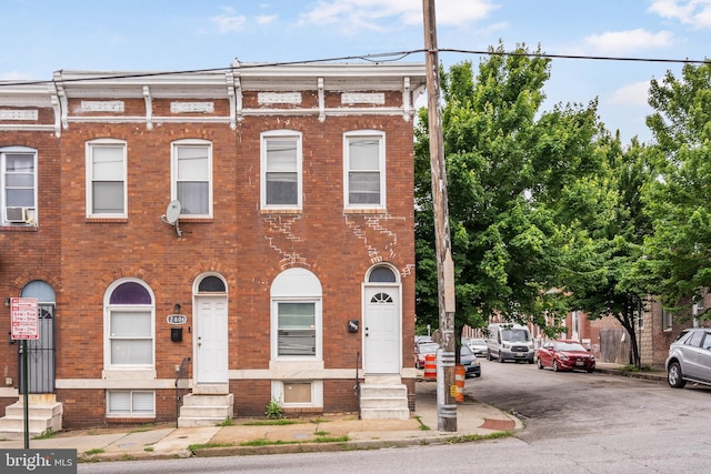 2808 Orleans St, Baltimore, MD 21224 - townhome / multi-family property featuring entry steps and brick siding