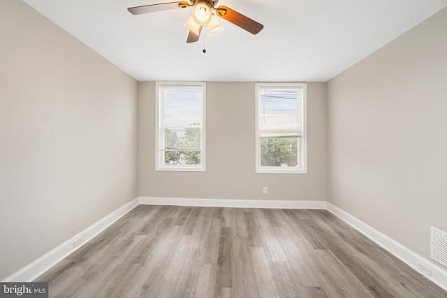 2808 Orleans St, Baltimore, MD 21224 - empty room with wood finished floors, baseboards, and ceiling fan