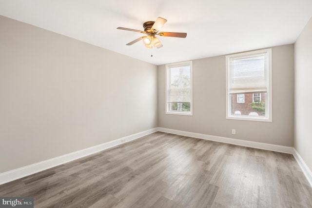 2808 Orleans St, Baltimore, MD 21224 - spare room featuring light wood-type flooring, ceiling fan, and baseboards
