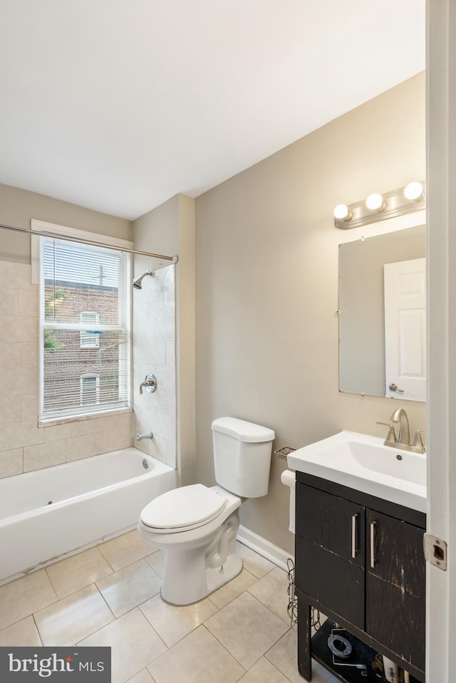 2808 Orleans St, Baltimore, MD 21224 - full bath with toilet, vanity, tile patterned floors, tub / shower combination, and baseboards
