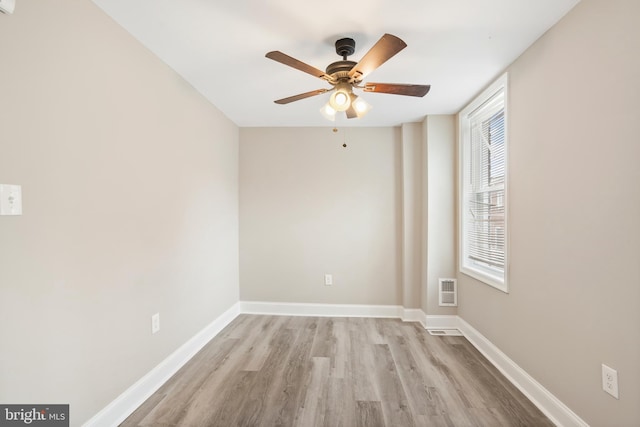 2808 Orleans St, Baltimore, MD 21224 - empty room with light wood-type flooring, a ceiling fan, and baseboards