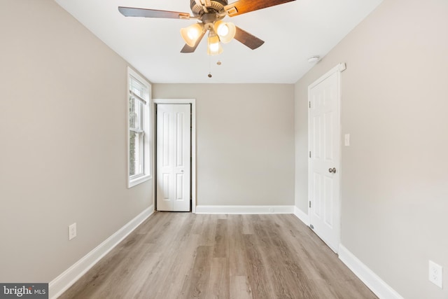 2808 Orleans St, Baltimore, MD 21224 - unfurnished room with light wood-style flooring, a ceiling fan, baseboards, and a smoke detector