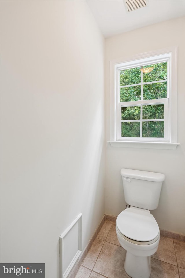 14908 Little Bennett Dr, Clarksburg, MD 20871 - bathroom with toilet, baseboards, and tile patterned flooring