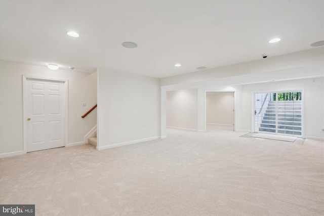 14908 Little Bennett Dr, Clarksburg, MD 20871 - below grade area featuring light colored carpet, stairway, baseboards, and recessed lighting
