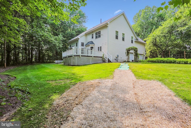 14908 Little Bennett Dr, Clarksburg, MD 20871 - rear view of house featuring a wooden deck, a lawn, and a garage