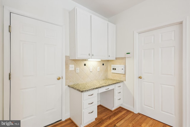 14908 Little Bennett Dr, Clarksburg, MD 20871 - unfurnished office with light wood finished floors, built in study area, and baseboards