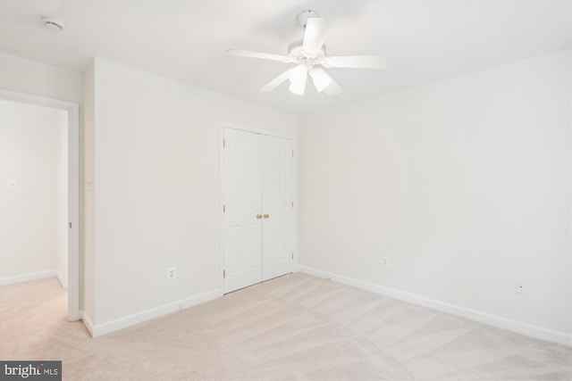 14908 Little Bennett Dr, Clarksburg, MD 20871 - unfurnished bedroom featuring light colored carpet, a closet, baseboards, and ceiling fan