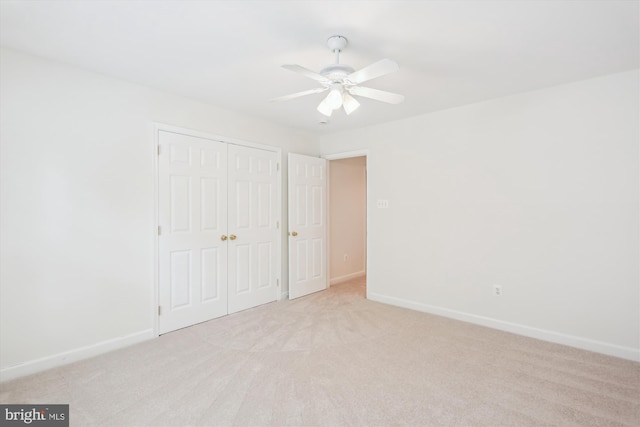 14908 Little Bennett Dr, Clarksburg, MD 20871 - unfurnished bedroom featuring a closet, baseboards, light carpet, and ceiling fan