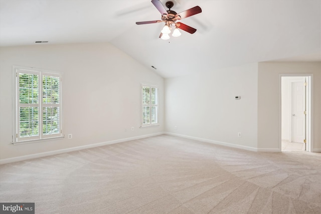 14908 Little Bennett Dr, Clarksburg, MD 20871 - spare room featuring light colored carpet, plenty of natural light, ceiling fan, lofted ceiling, and baseboards