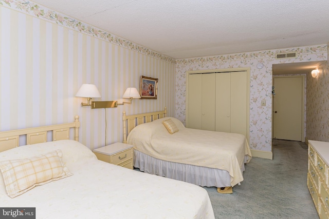 2901 Atlantic Ave Unit 404, Ocean City, MD 21842 - carpeted bedroom featuring wallpapered walls and a closet