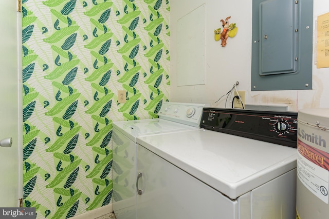 2901 Atlantic Ave Unit 404, Ocean City, MD 21842 - laundry area with electric panel, independent washer and dryer, and water heater