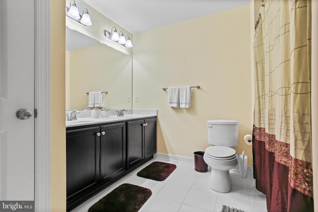 43 Triple Crown Dr Unit 441, Taneytown, MD 21787 - full bathroom with tile patterned flooring, toilet, baseboards, and double vanity